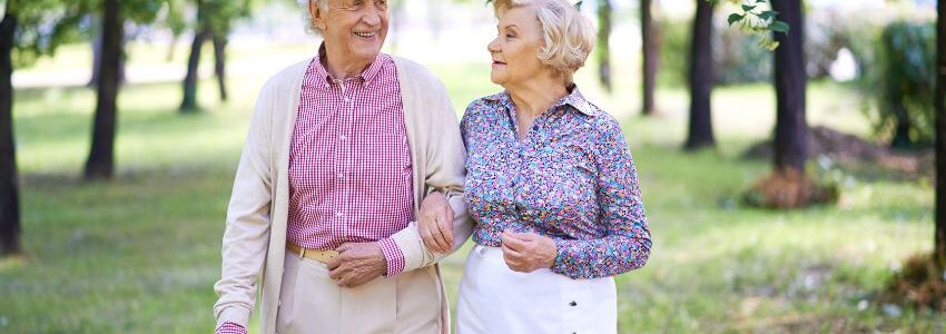 An elderly couple taking a walk with natural energy boost from NAD supplementation.