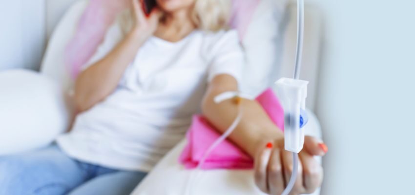 The woman undergoes NAD+ IV therapy infusion.