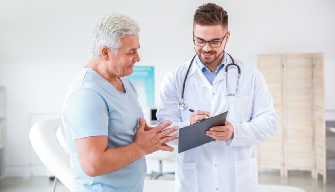senior consulting a doctor